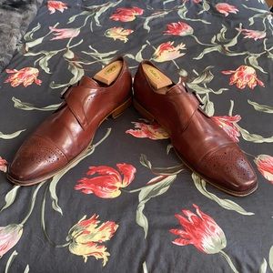 Dark tan Stacy Adams used wing tip